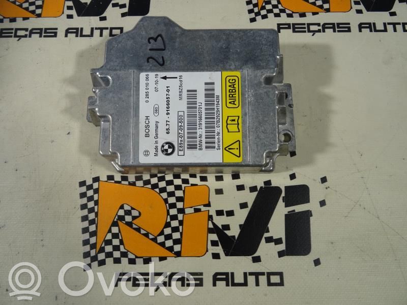 Sterownik / Moduł Airbag   65779166057,0285010066,9166057,SERIE1E81,SERIE3E90