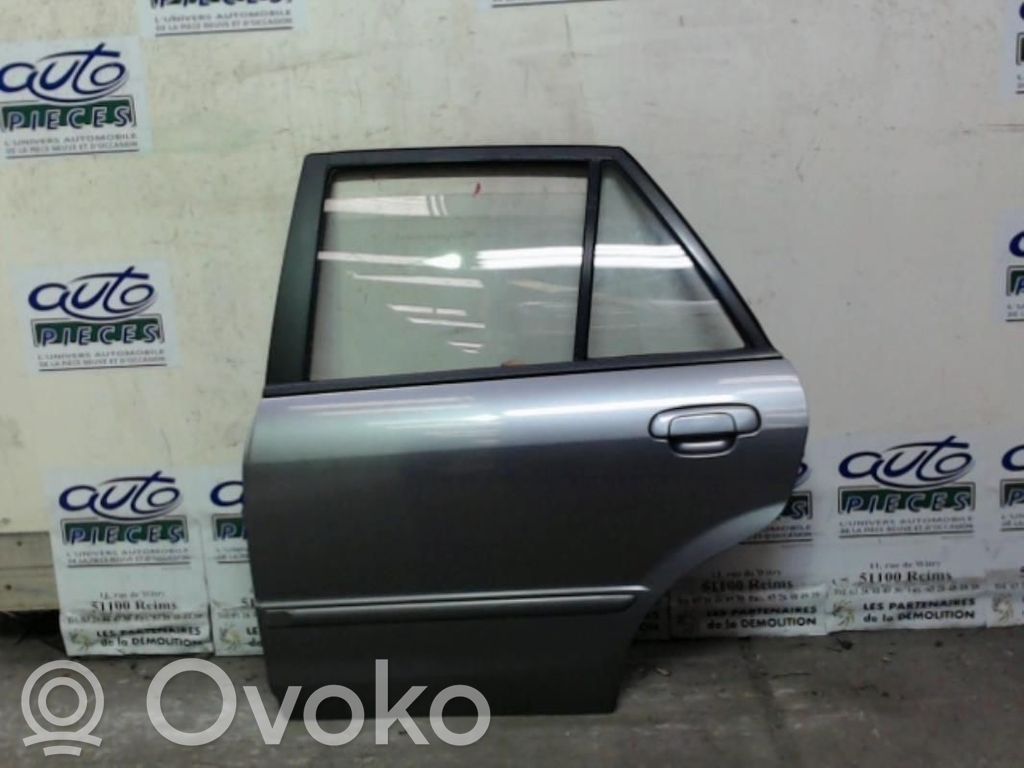 Mazda 323 F Galinės durys 