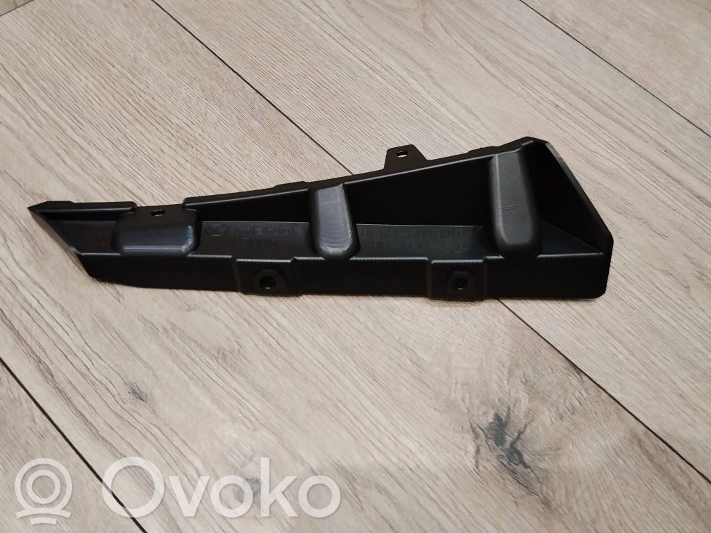 Mazda 3 Uchwyt / Mocowanie zderzaka przedniego 
