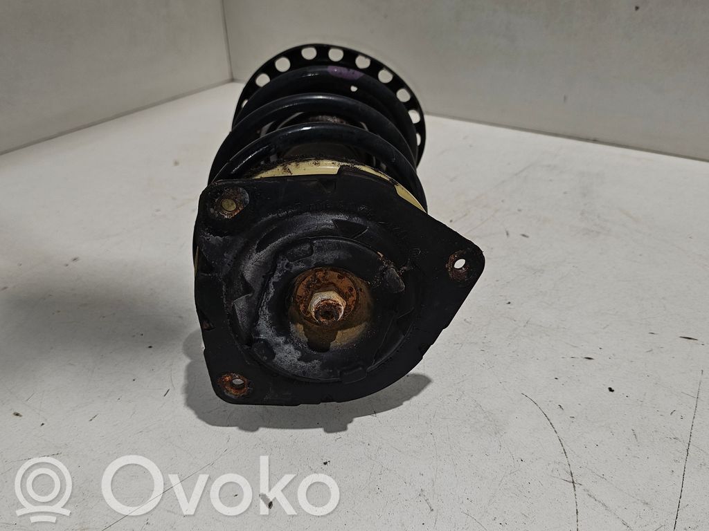 Renault Clio III Amortyzator osi przedniej ze sprężyną 