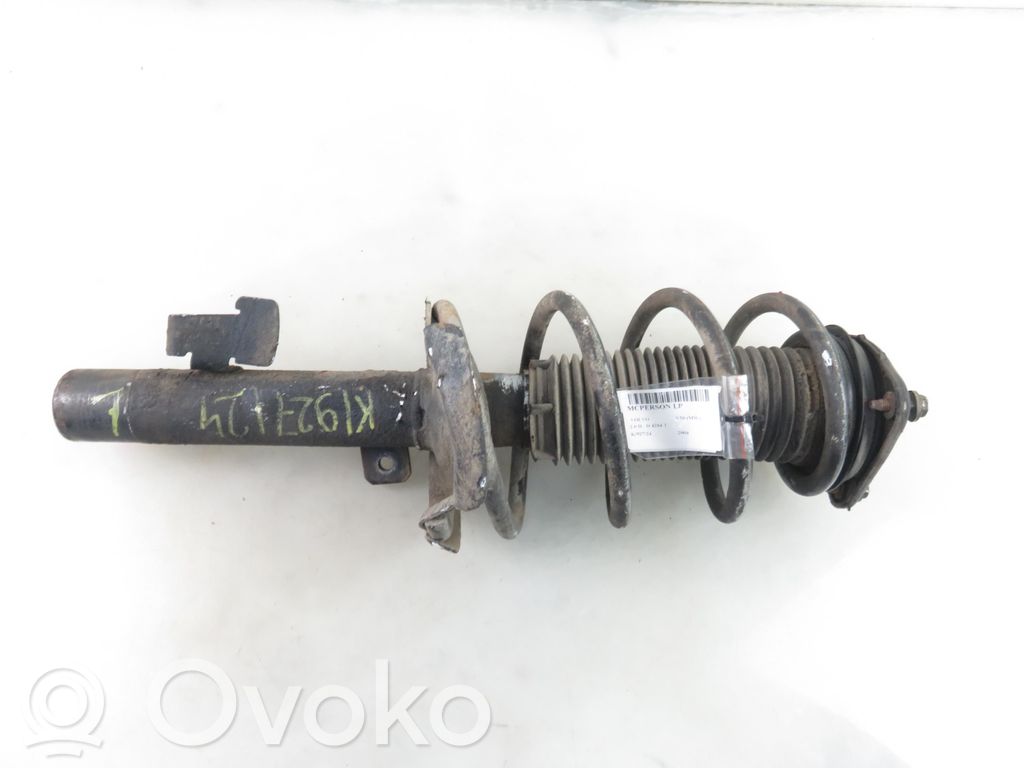 Front shock absorber with coil spring