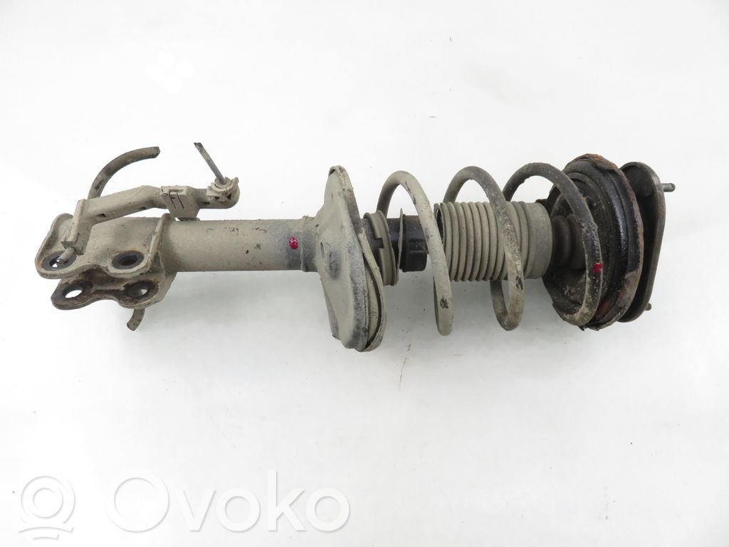 Front shock absorber with coil spring