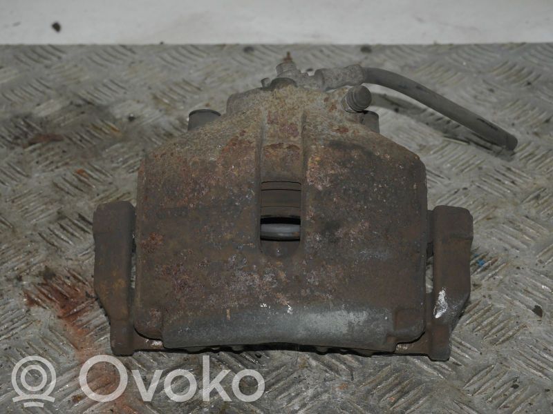 Zacisk hamulcowy przedni   1K0615123E,1K0615123E