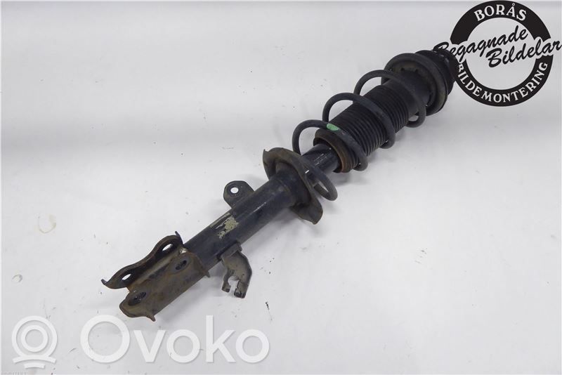 Nissan Note (E12) Front shock absorber with coil spring 