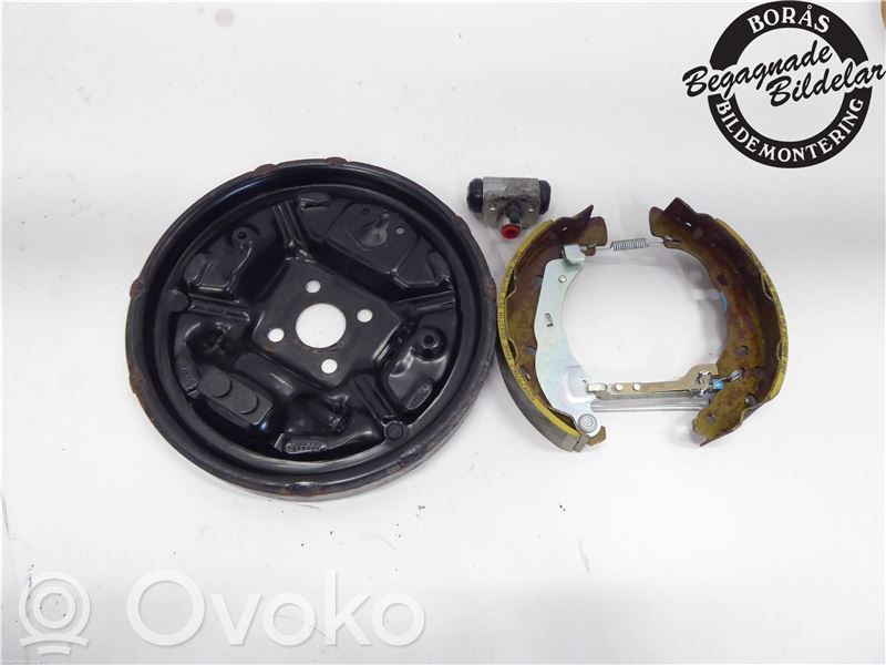 Nissan Note (E12) Takajarrun jarrulevyn pölysuoja 