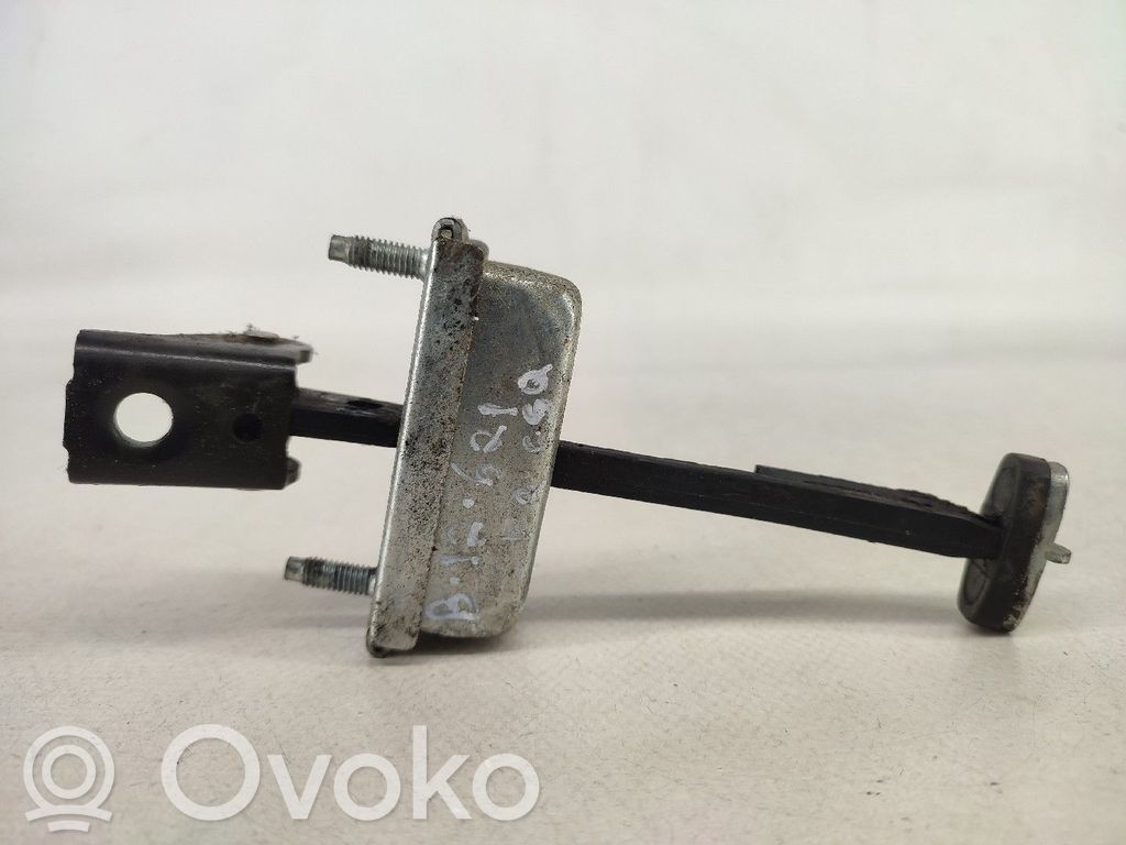 Front door check strap stopper   FRENTE,ESQUERDA