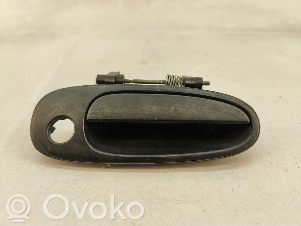 Toyota Corolla E110 Manecilla externa puerta delantera 
