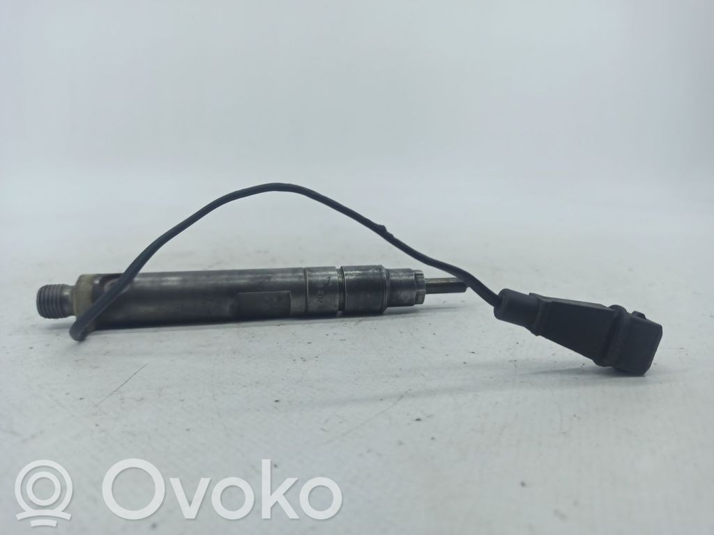 Inyector de combustible   074130202B