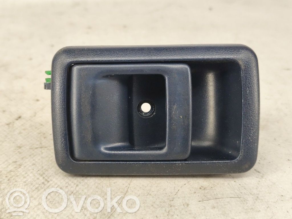 Toyota Corolla E90 Etuoven ulkokahvan kehys 