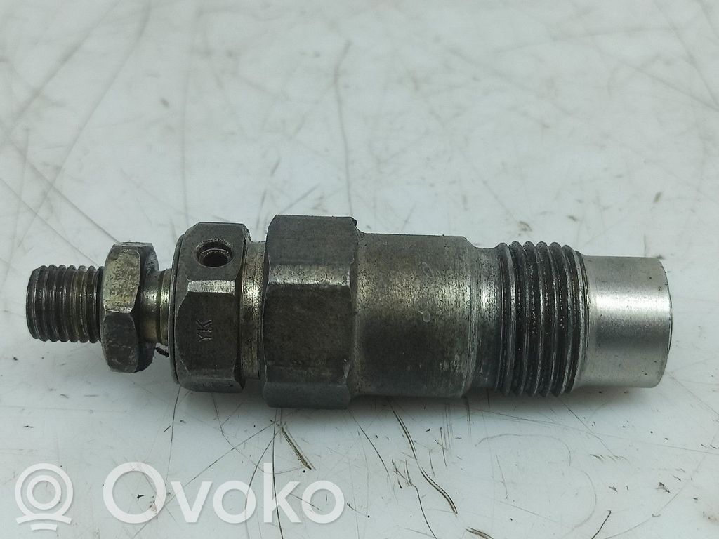 Inyector de combustible