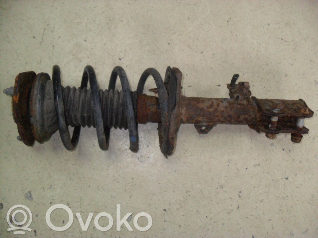 Front shock absorber with coil spring