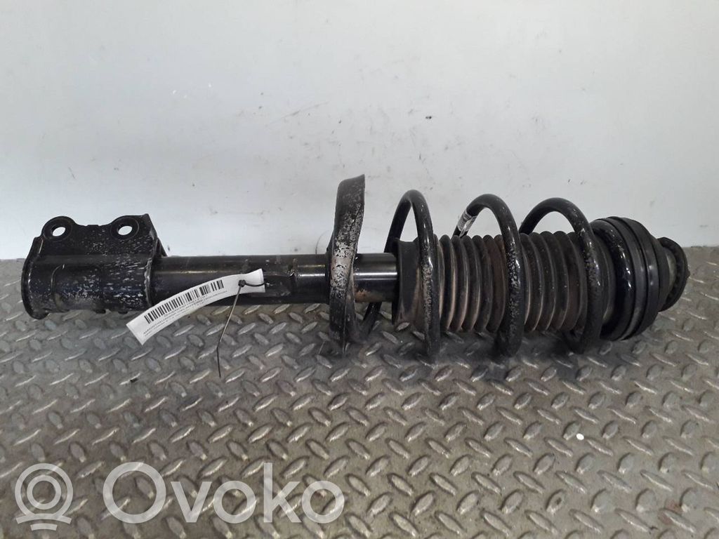 Opel Corsa E Etuiskunvaimennin kierrejousella 