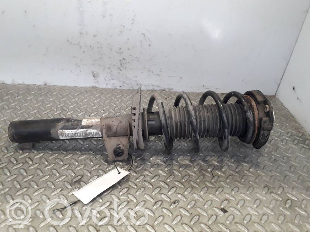 Volkswagen Jetta V Amortyzator osi przedniej ze sprężyną 