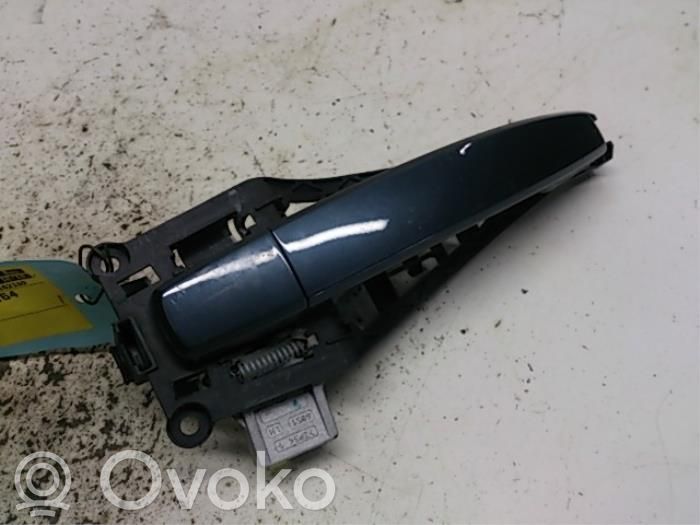 Opel Corsa D Klamka zewnętrzna drzwi tylnych 