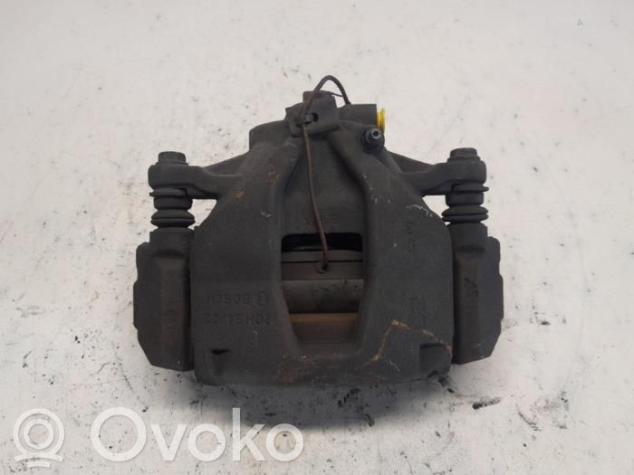 Opel Combo D Front brake caliper 