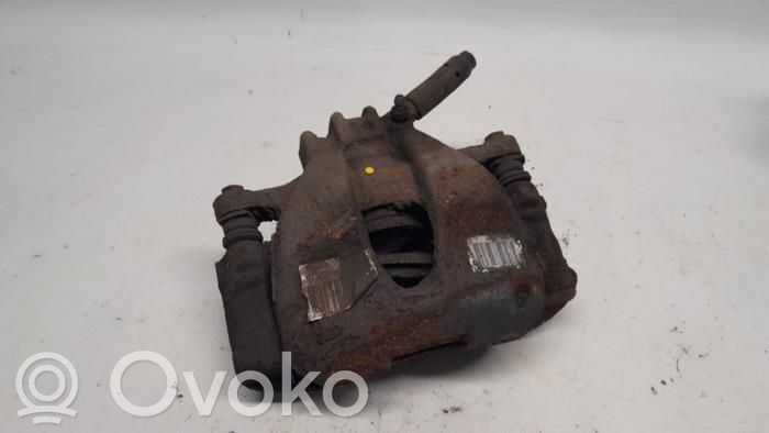Peugeot 308 Zacisk hamulcowy przedni 