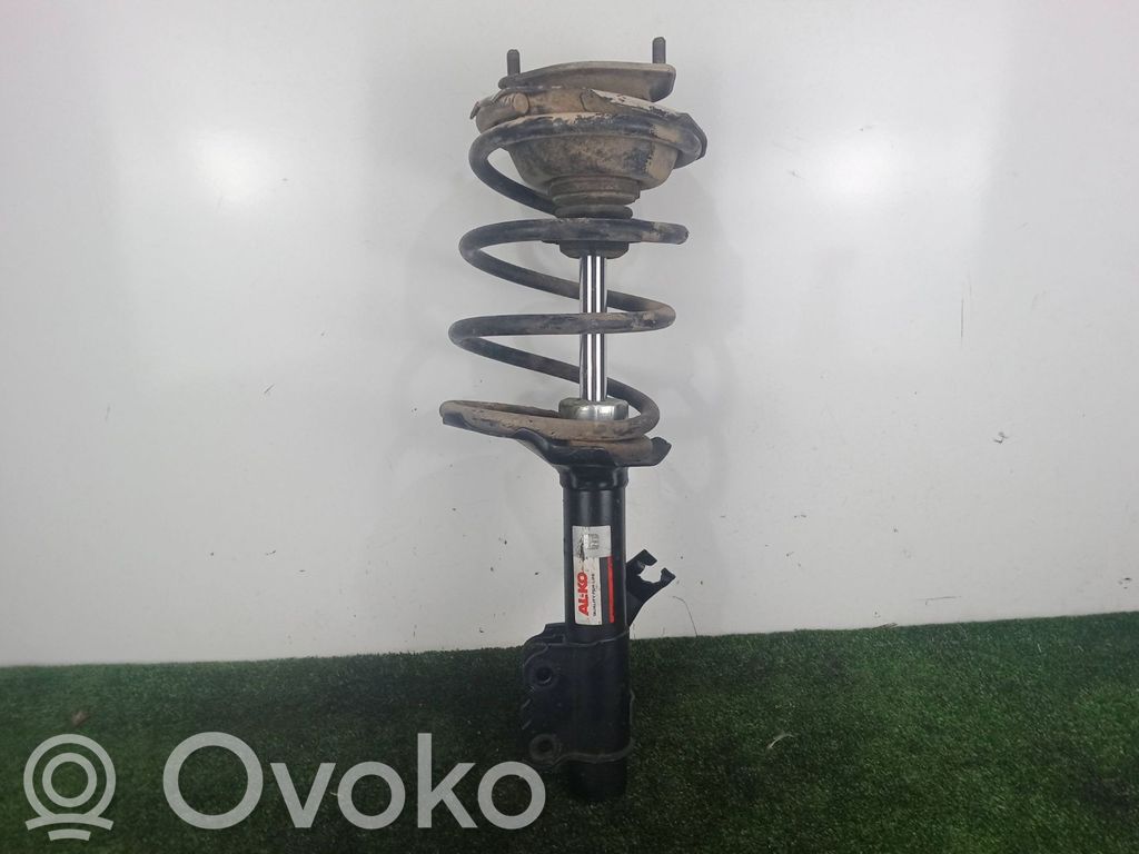 Nissan Serena Amortiguador delantero con muelle espiral 