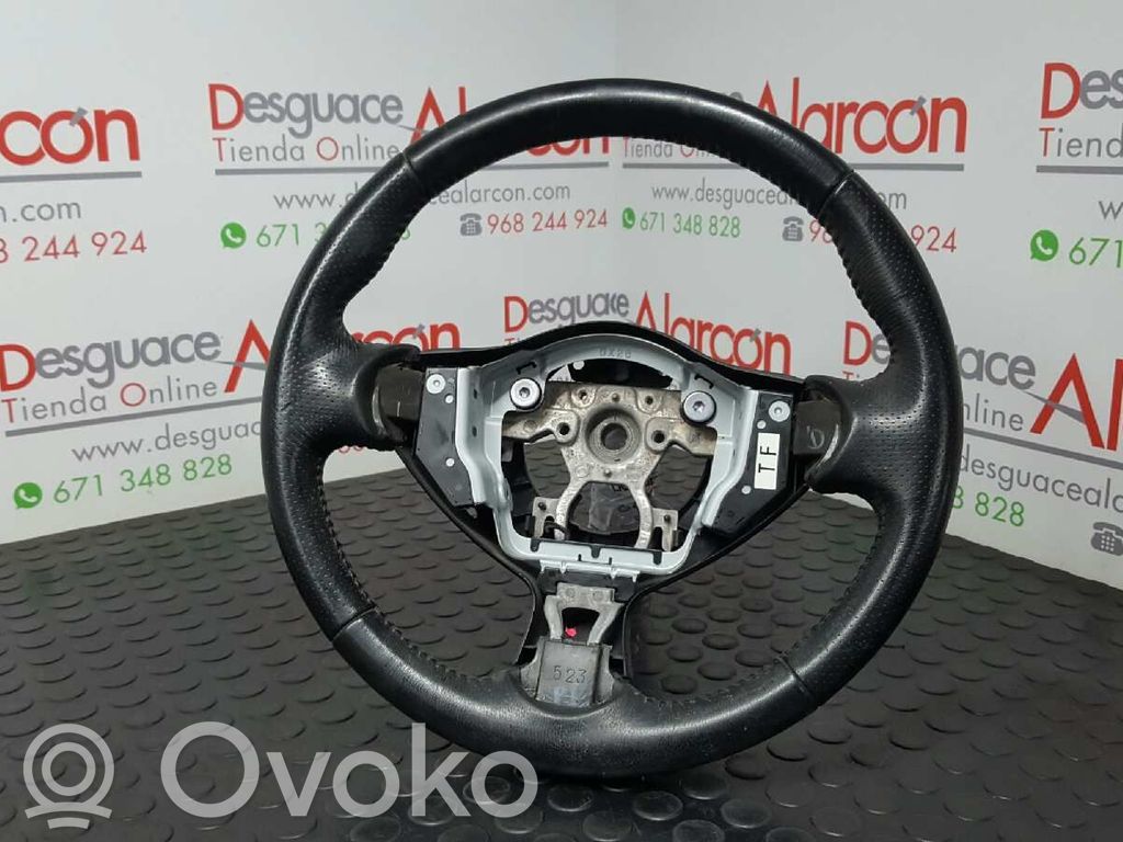 Nissan Juke I F15 Zacisk hamulcowy przedni 