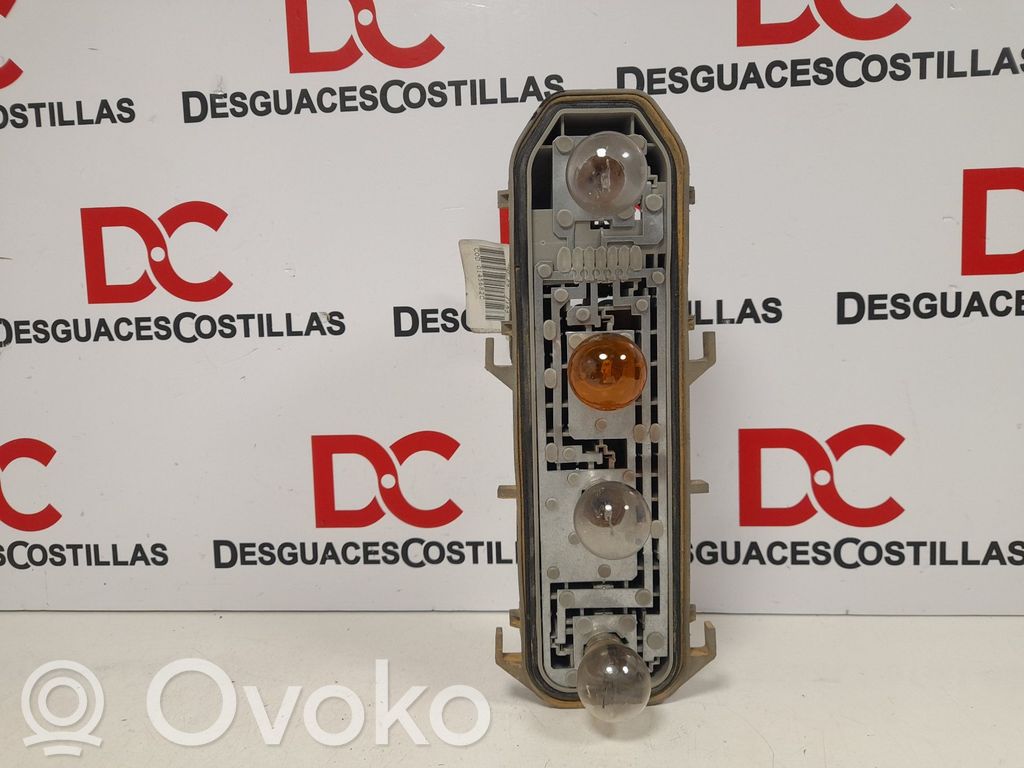 Renault Clio II Takavalon polttimon suojan pidike 