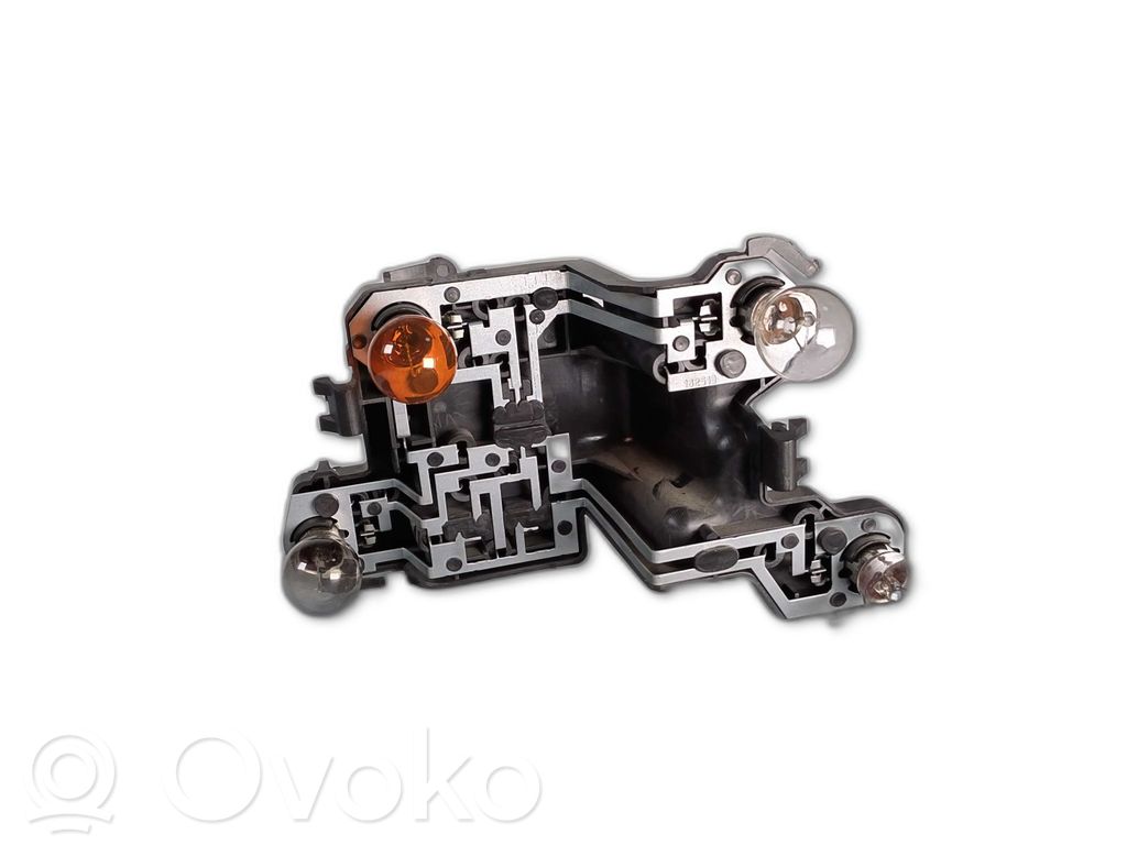 Volvo S80 Takavalon polttimon suojan pidike 