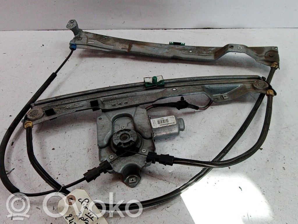 Renault Clio III Elektryczny podnośnik szyby drzwi przednich 