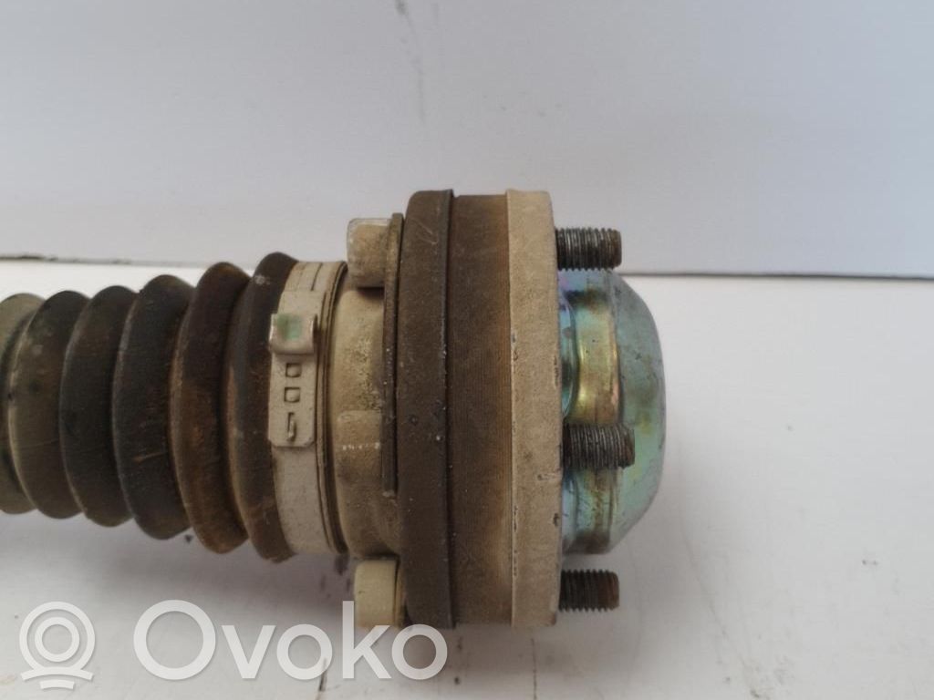 Volkswagen Caddy Eje de transmisión delantero 