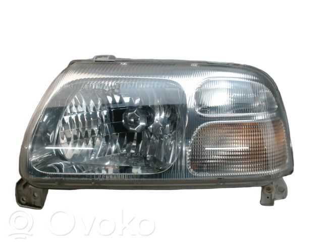 Suzuki Grand Vitara I Lampa przednia 