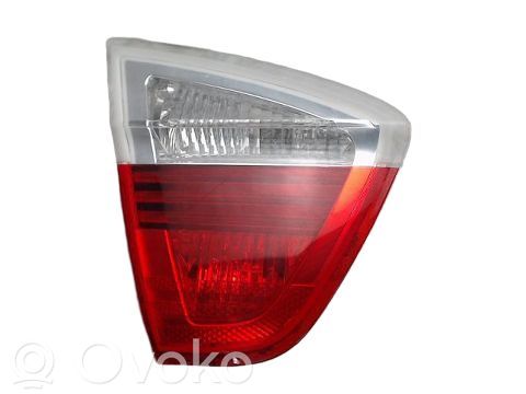 BMW 3 E90 E91 Aizmugurējais lukturis pārsegā 