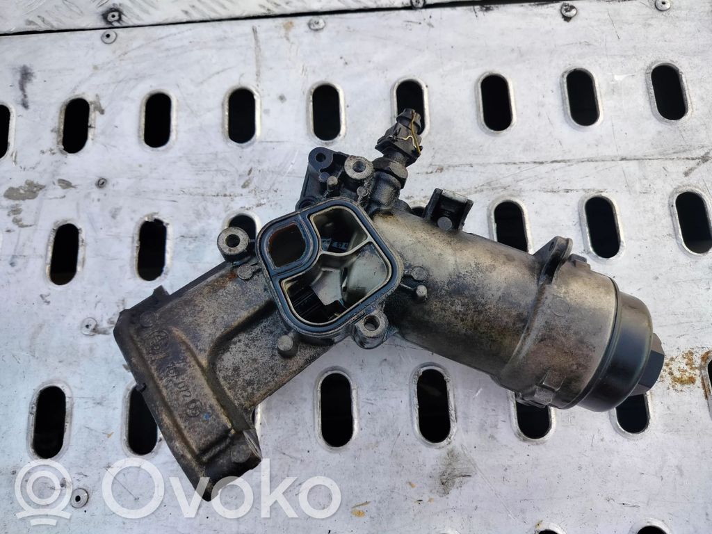 Engine oil radiator   7787072,6740330110