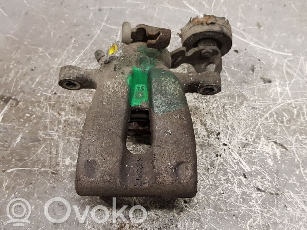 Opel Astra G Tylny zacisk hamulcowy 
