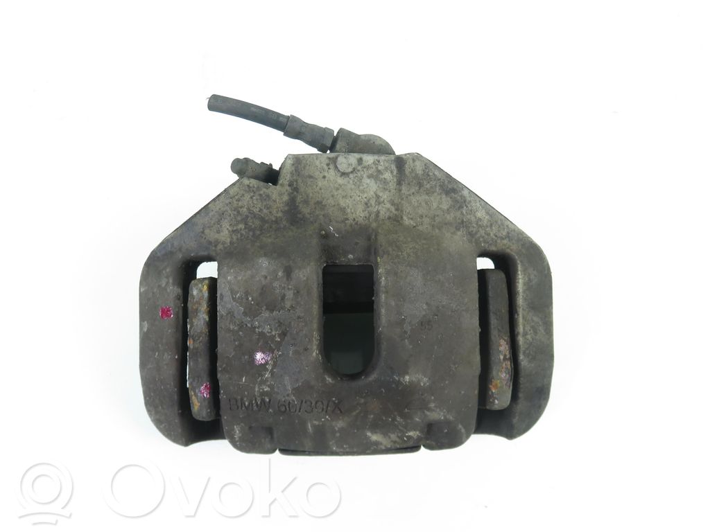 Caliper de freno delantero