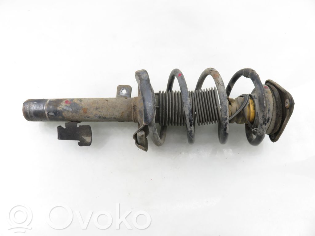 Front shock absorber with coil spring