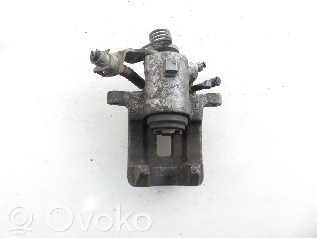 Volkswagen Golf IV Tylny zacisk hamulcowy 