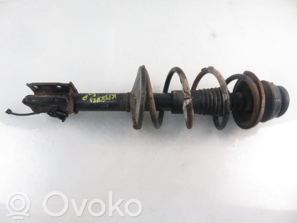 Dacia Logan I Front shock absorber with coil spring