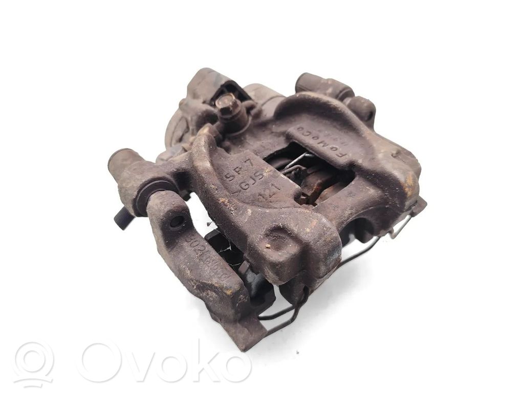 Ford Mondeo MK V Tylny zacisk hamulcowy 