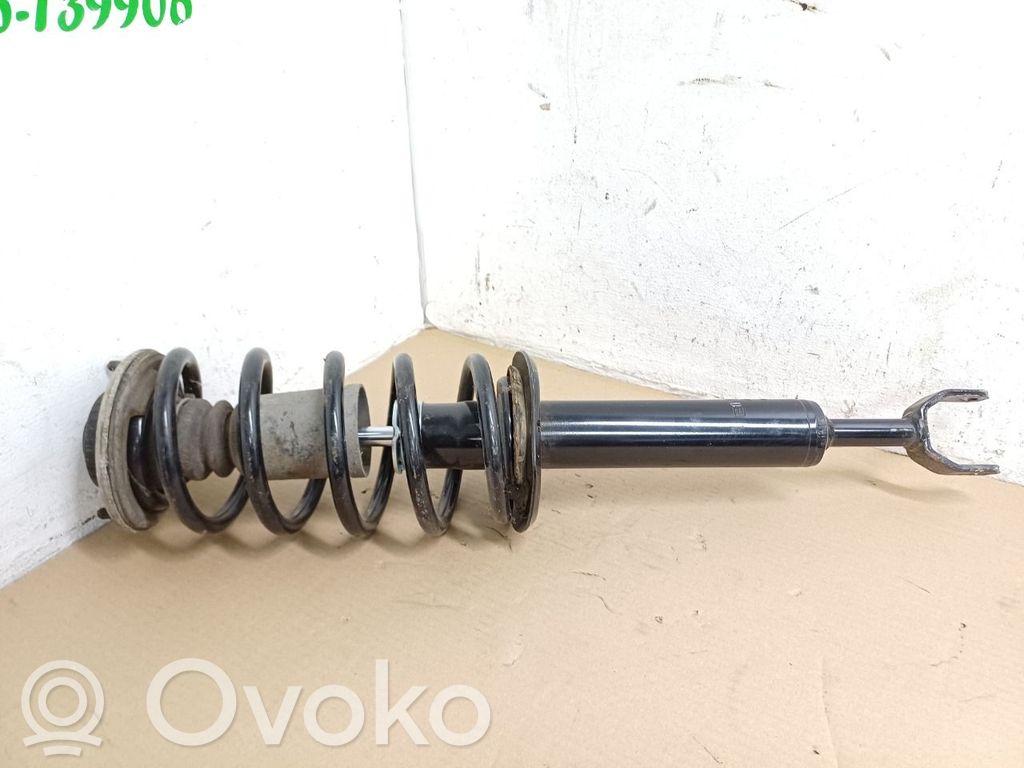Amortyzator osi przedniej ze sprężyną   8D0411105AM,687457