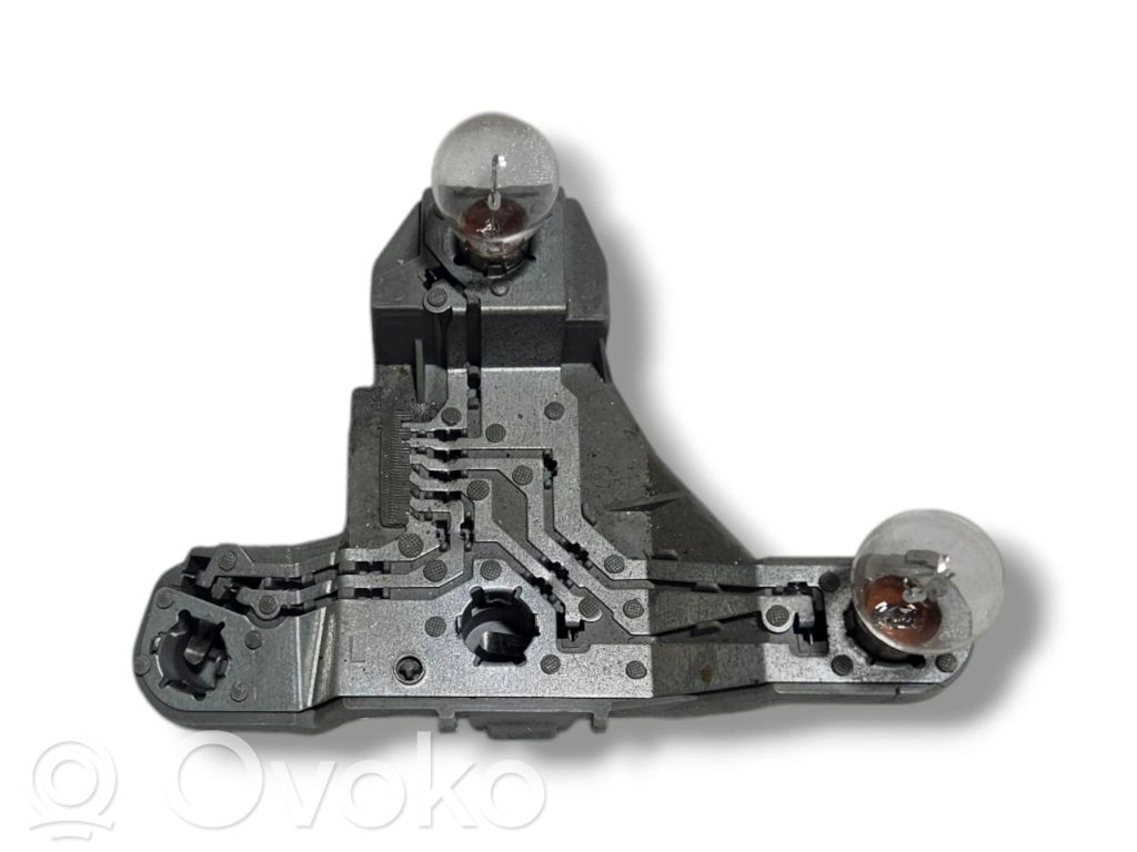Toyota Corolla E120 E130 Aizmugures spuldzes vāka turētājs 