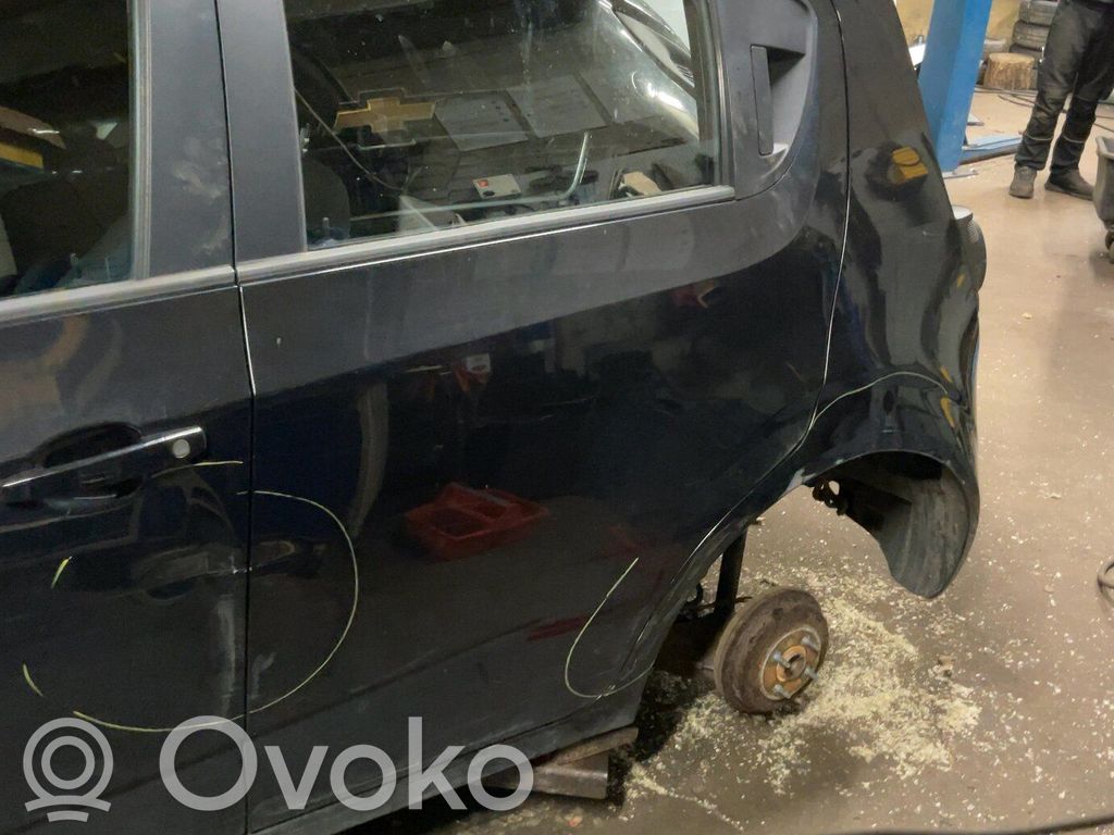 Chevrolet Aveo Elektryczny podnośnik szyby drzwi przednich 