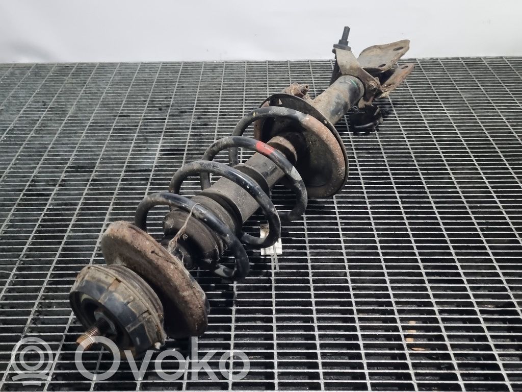 Front shock absorber with coil spring