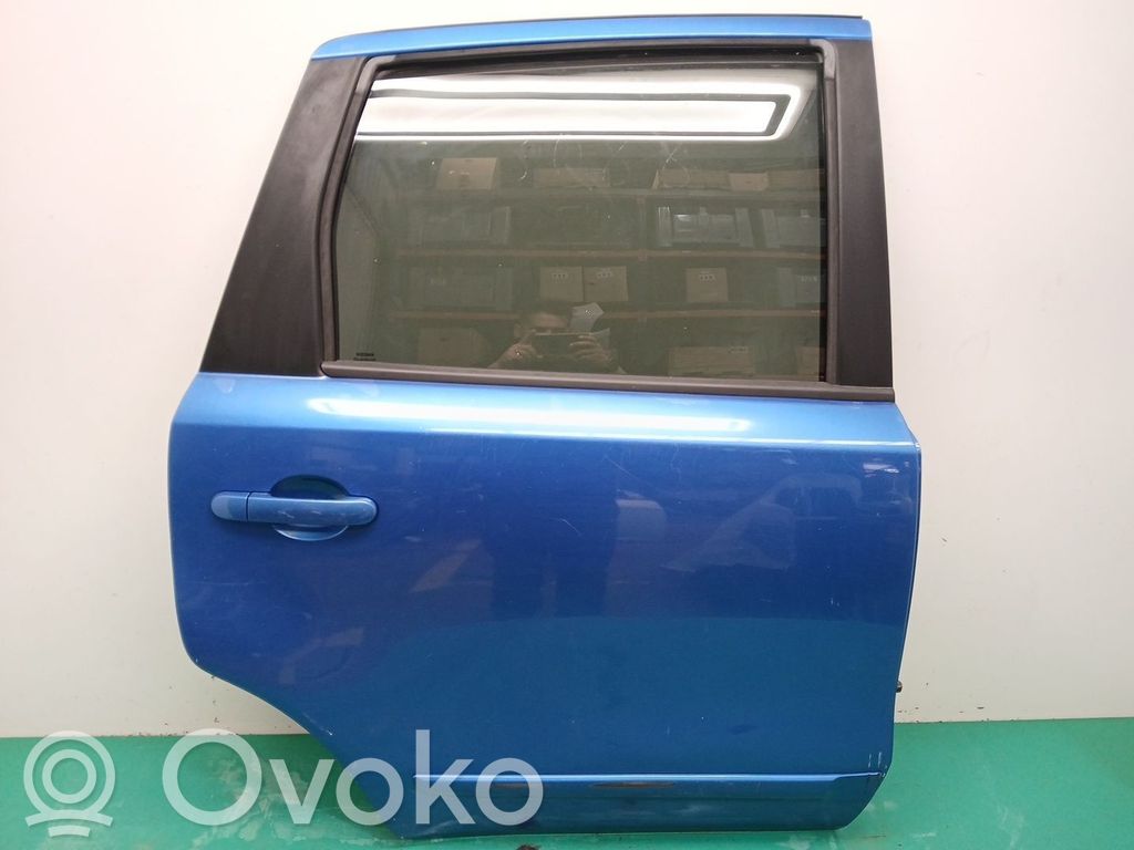 Puerta trasera   H21009U0M0