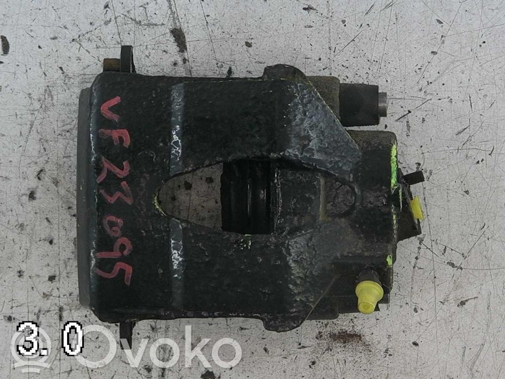 Volkswagen Golf VI Front brake caliper 