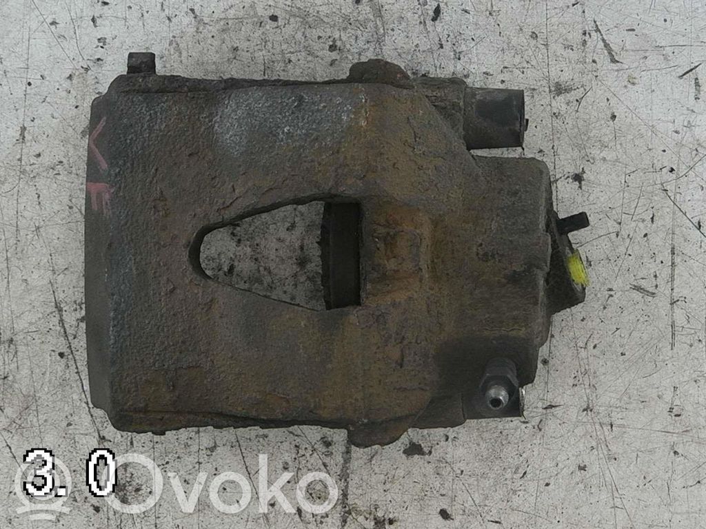 Volkswagen Golf VI Front brake caliper 