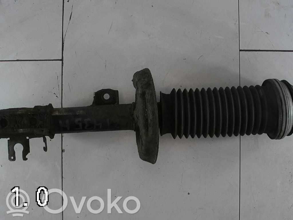 Opel Corsa D Amortyzator osi przedniej ze sprężyną 
