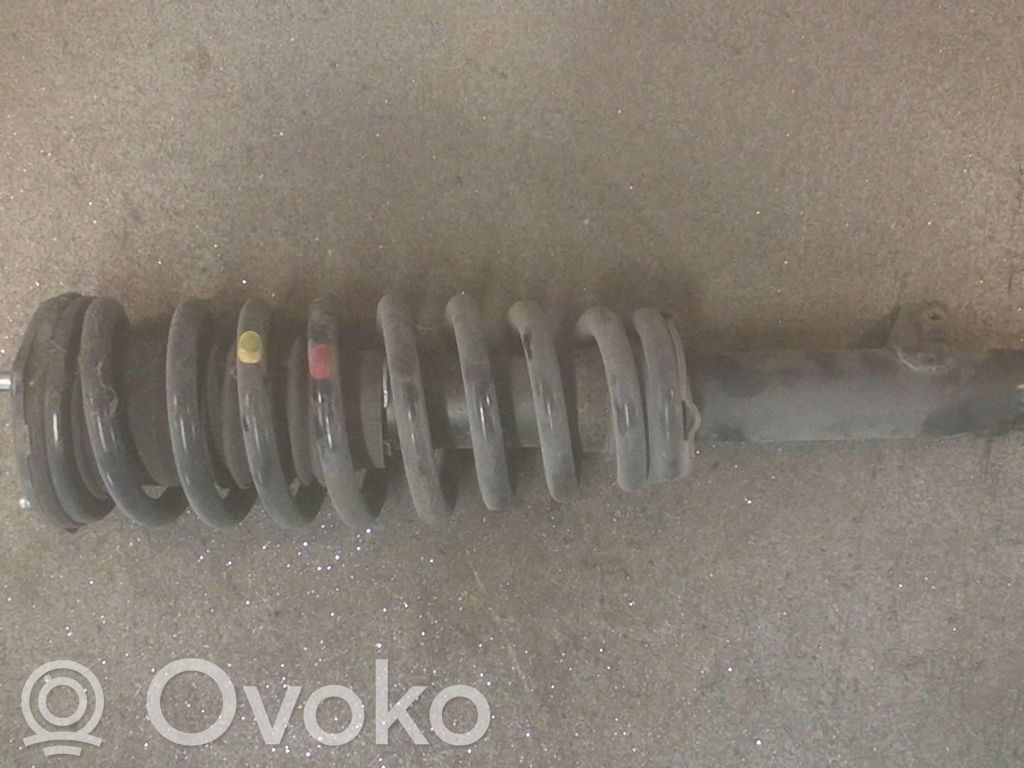 Front shock absorber with coil spring   GS1D34900G