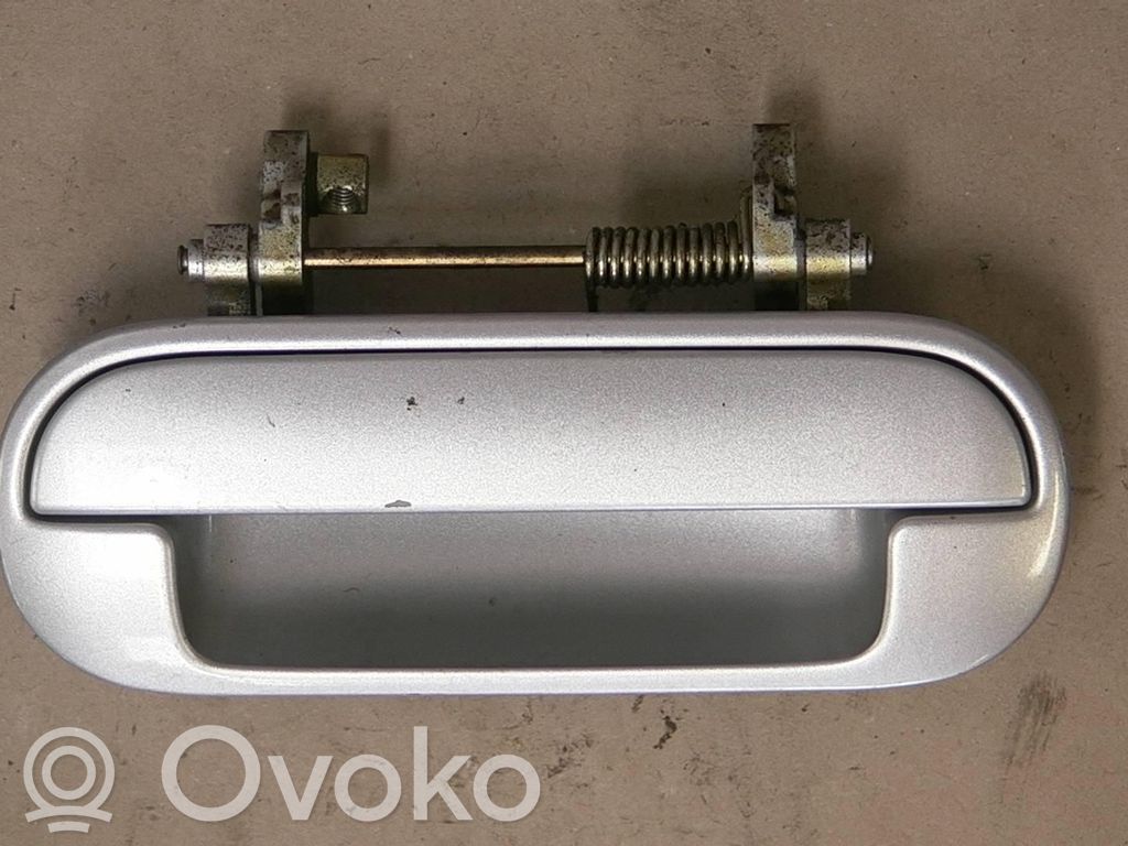 Manecilla externa puerta delantera