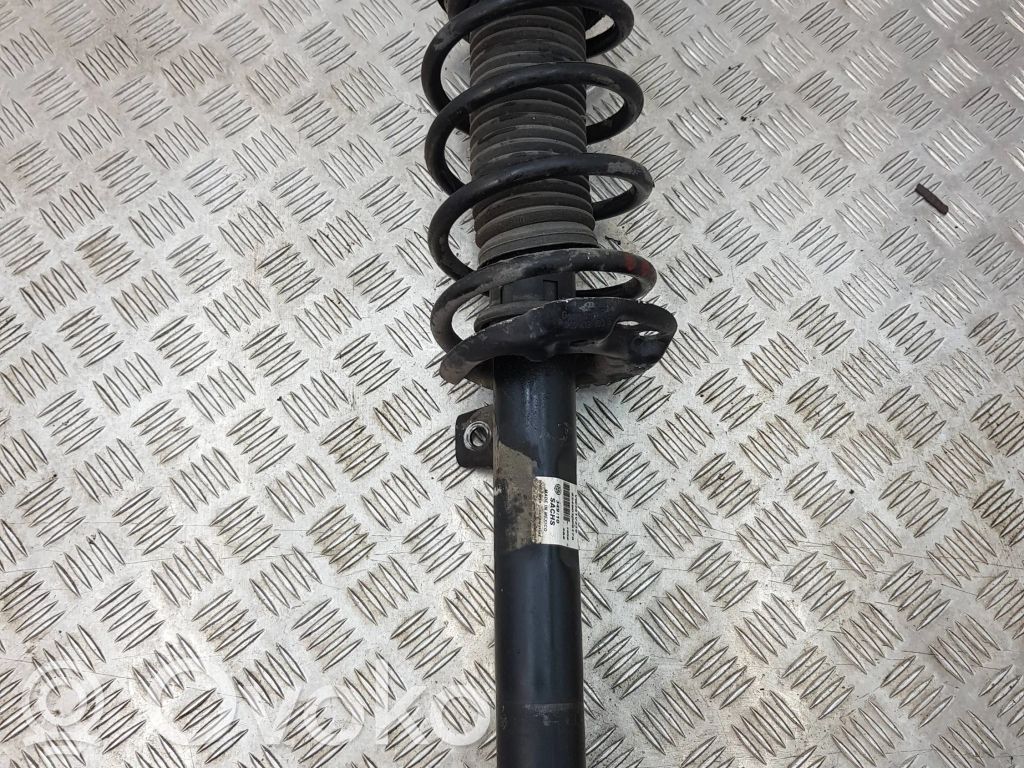 Volkswagen Jetta VI Front shock absorber with coil spring 