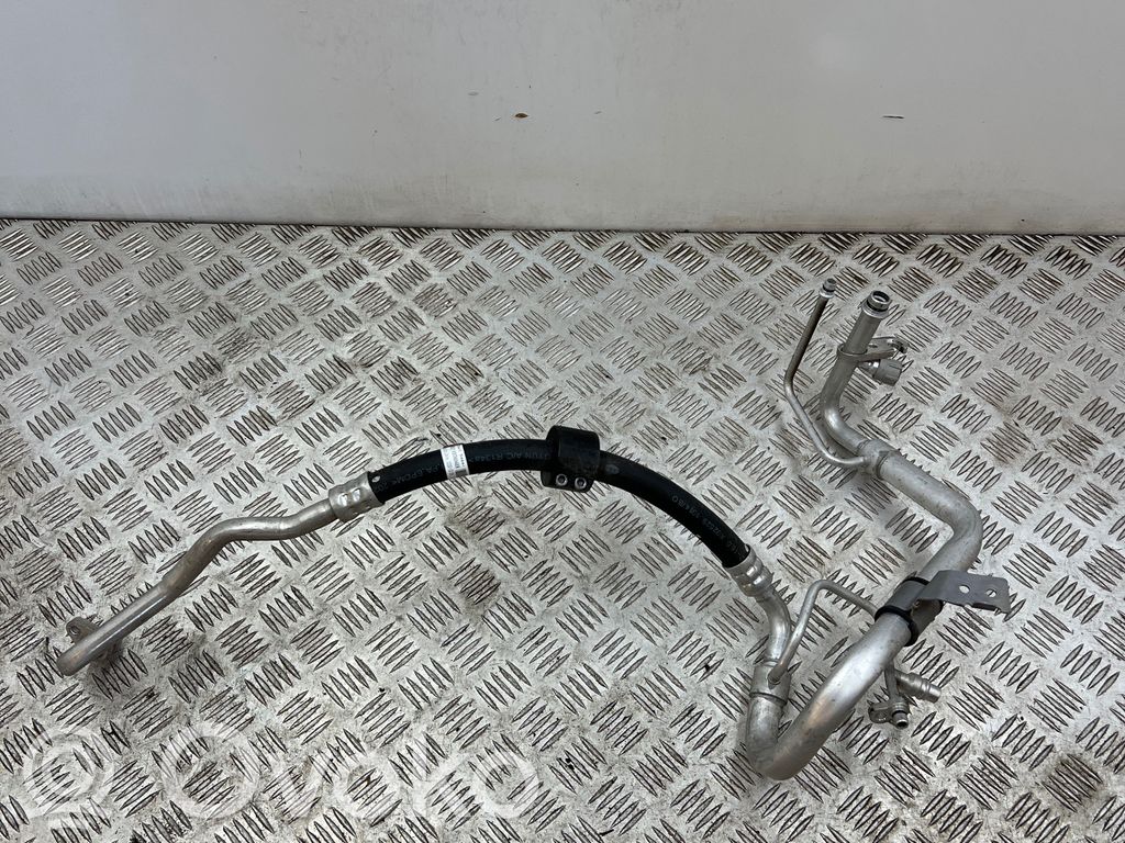 Dacia Spring Ilmastointilaitteen putki (A/C) 