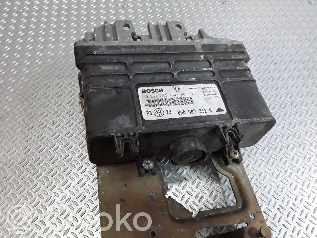Engine control unit/module   0261203184,8A0907311H