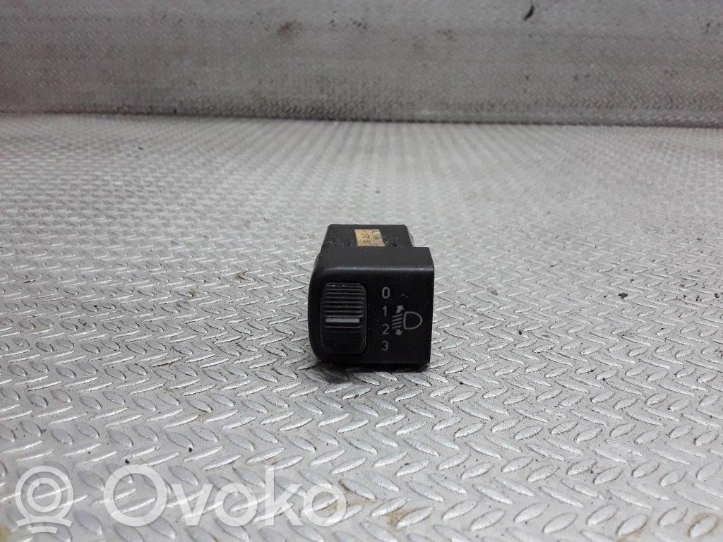 Headlight level height control switch   5106257