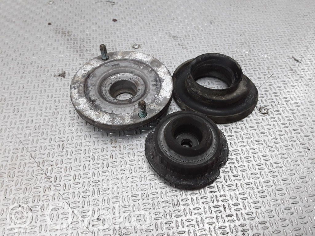 Front coil spring rubber mount